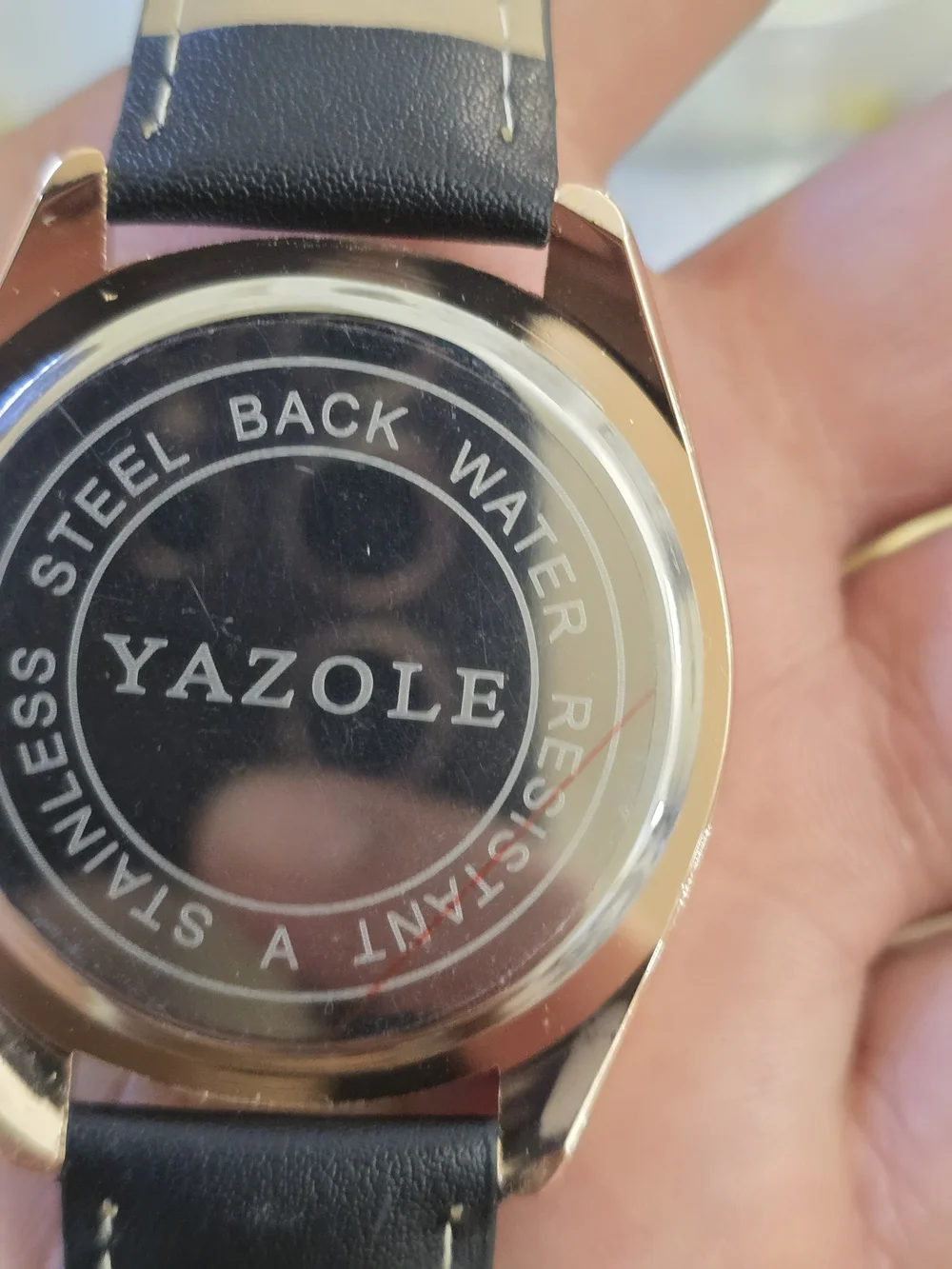 Yazole Men's Black Dial Rose Gold Case Leather Strap Watch